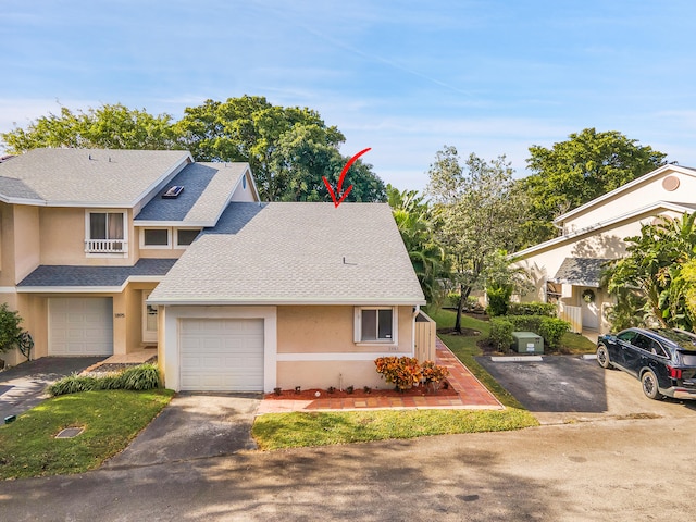 view of front of property featuring a garage