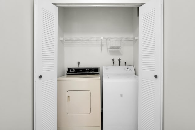 laundry area featuring washer and clothes dryer