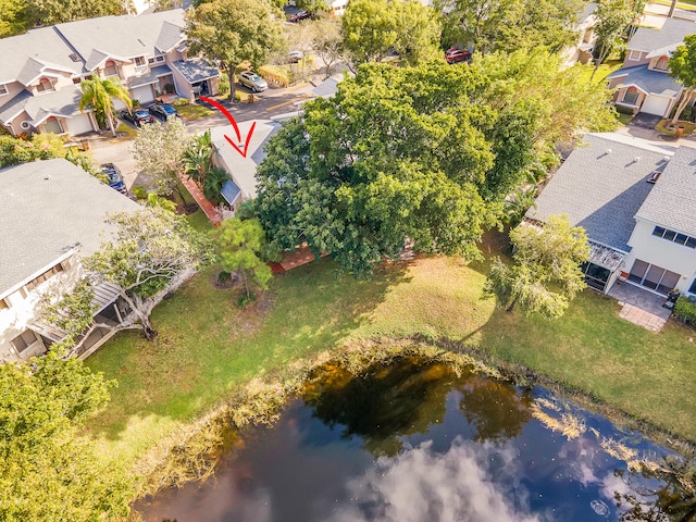 drone / aerial view with a water view