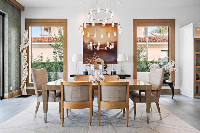 dining area featuring a chandelier