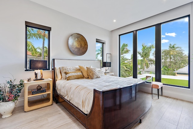 bedroom featuring light wood-type flooring