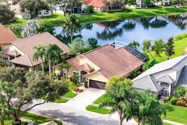 drone / aerial view with a water view