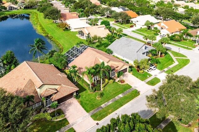 bird's eye view with a water view