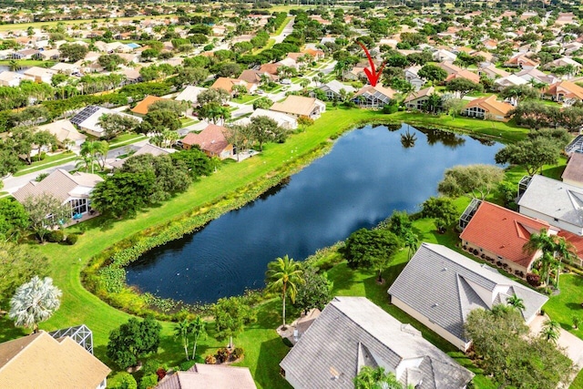 drone / aerial view with a water view