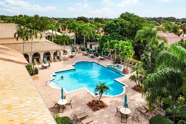 view of swimming pool featuring a patio