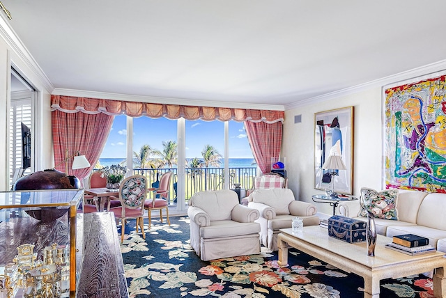 living room featuring a healthy amount of sunlight, a water view, and ornamental molding