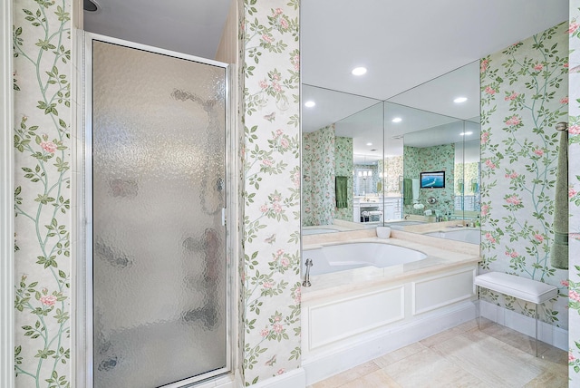 bathroom with plus walk in shower and tile patterned flooring