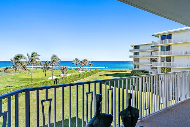 balcony featuring a water view