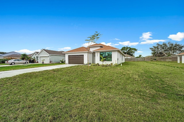 view of front facade featuring a front lawn and a garage