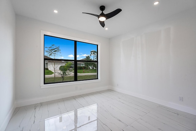 spare room featuring ceiling fan