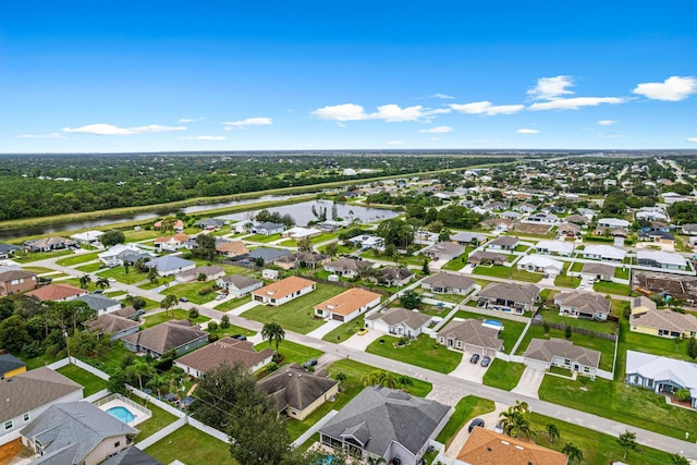 bird's eye view with a water view