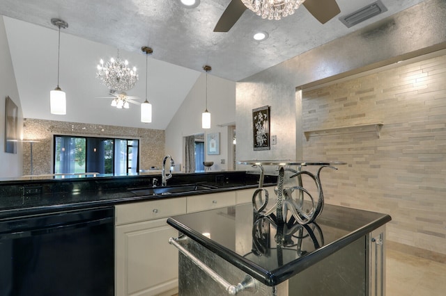 kitchen featuring ceiling fan, sink, white cabinets, black dishwasher, and lofted ceiling