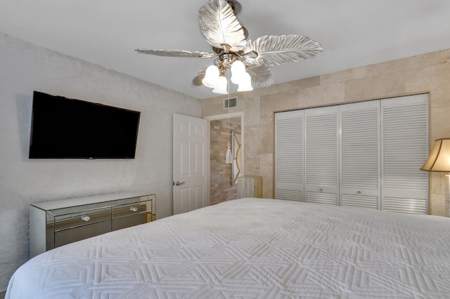 bedroom featuring a closet and ceiling fan