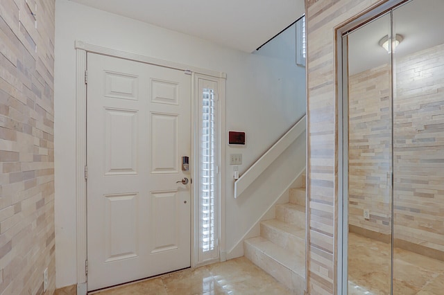 entrance foyer featuring tile patterned flooring