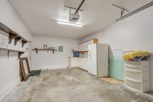 garage featuring electric panel, a garage door opener, and white refrigerator with ice dispenser