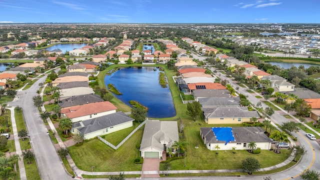 bird's eye view with a water view