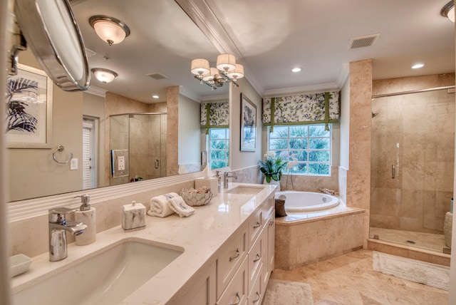 bathroom featuring vanity, independent shower and bath, a notable chandelier, and ornamental molding