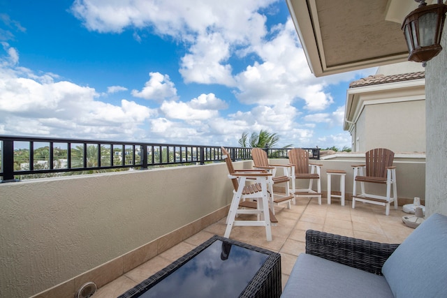 view of patio / terrace with a balcony