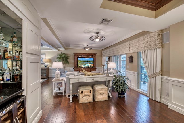 interior space with wine cooler, dark wood-type flooring, and crown molding