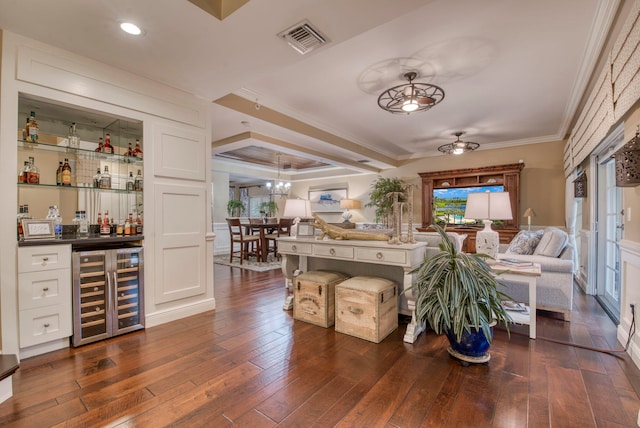 living room with bar area, crown molding, wine cooler, ceiling fan, and dark hardwood / wood-style flooring