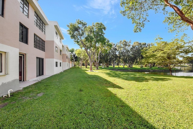 view of yard with a water view