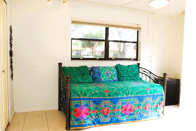 bedroom featuring tile patterned flooring