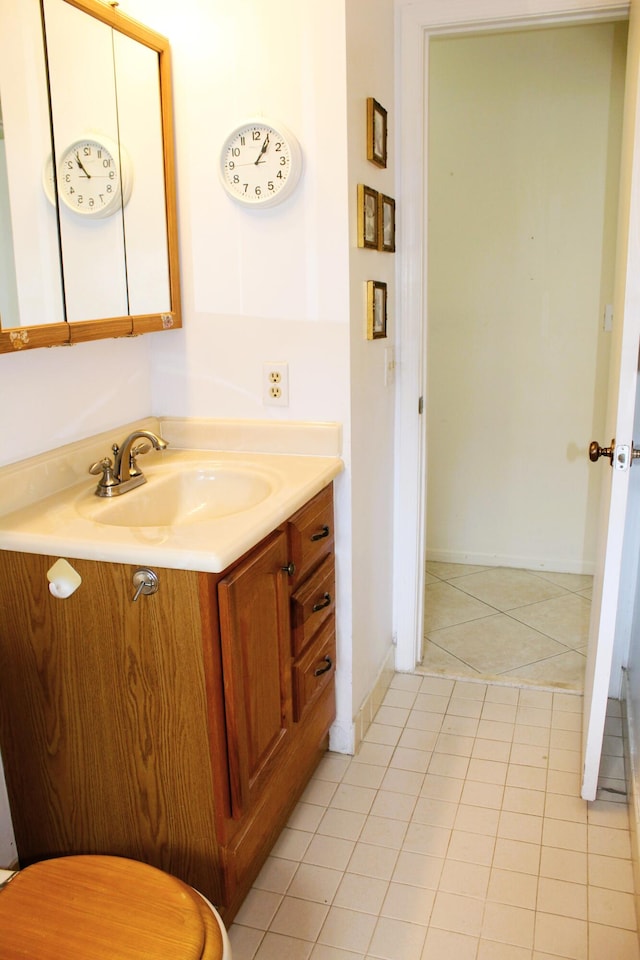 bathroom featuring tile patterned floors and vanity