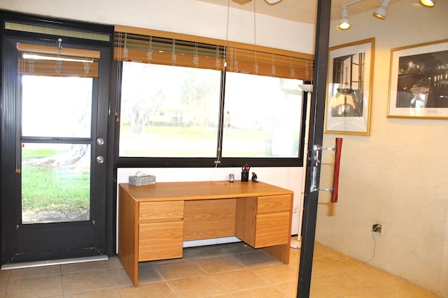 office featuring dark tile patterned flooring