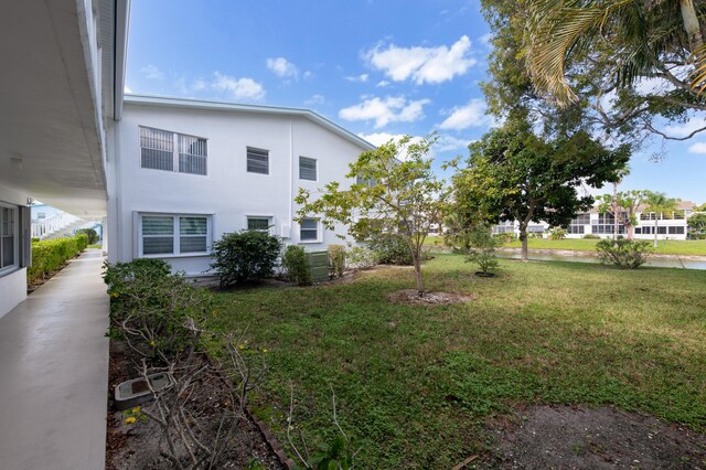 view of yard featuring central AC