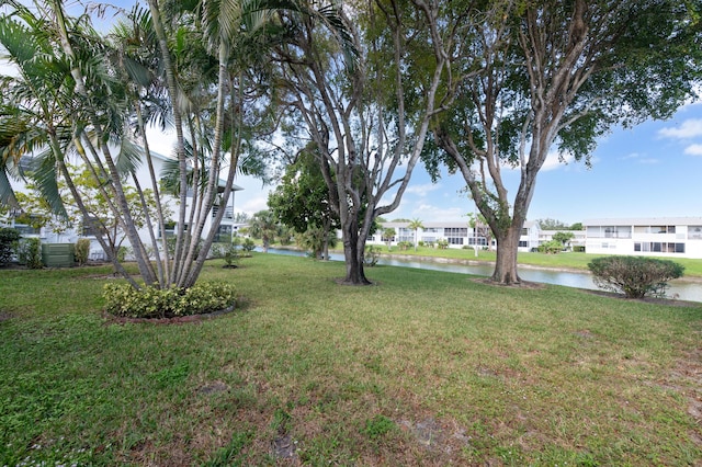 view of yard with a water view