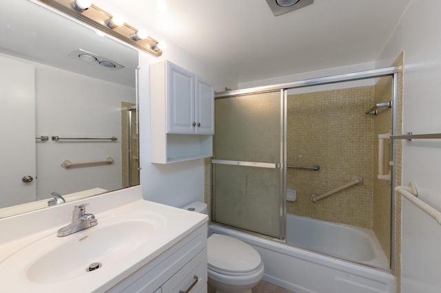 full bathroom featuring toilet, vanity, and enclosed tub / shower combo