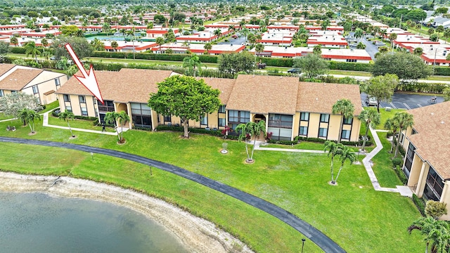 drone / aerial view featuring a water view