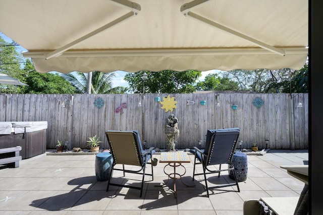 view of patio featuring a hot tub