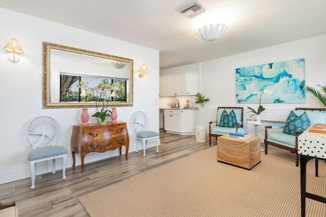 living area featuring light hardwood / wood-style flooring