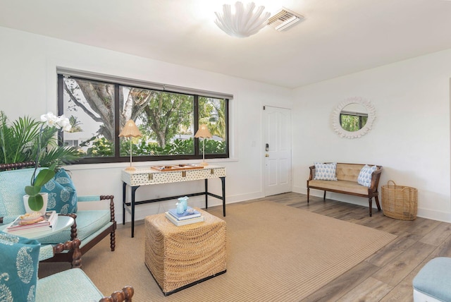 living area featuring hardwood / wood-style flooring