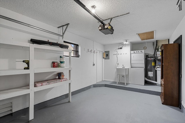 garage with electric water heater, a garage door opener, and stacked washer / drying machine