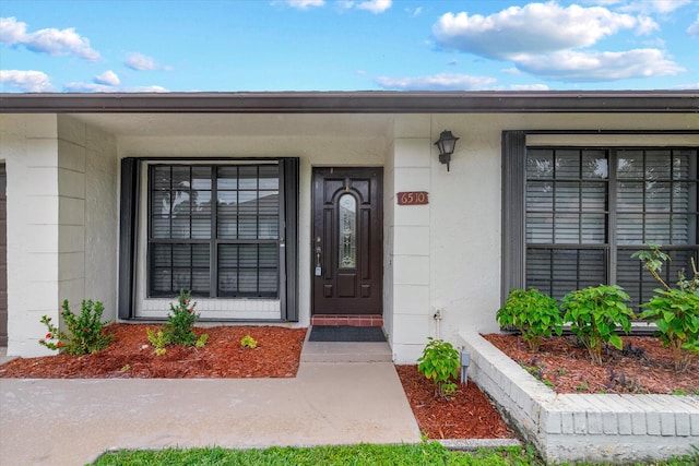 property entrance with a porch