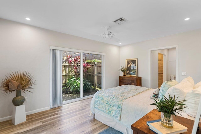 bedroom featuring access to exterior, light hardwood / wood-style flooring, and ceiling fan