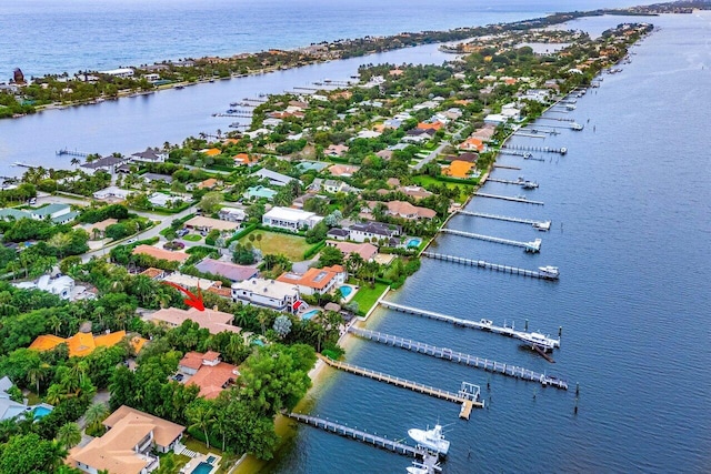 birds eye view of property featuring a water view