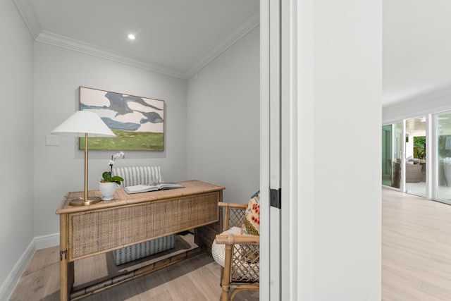 office area featuring crown molding and light wood-type flooring