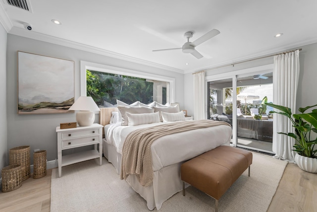 bedroom featuring ceiling fan, multiple windows, access to outside, and light wood-type flooring