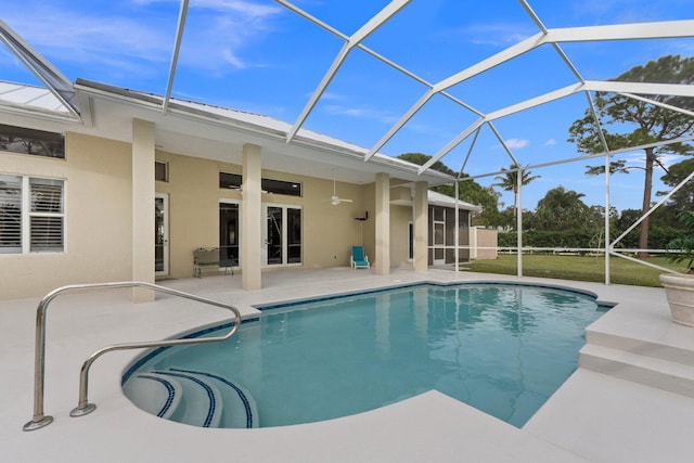 view of pool with a lanai and a patio