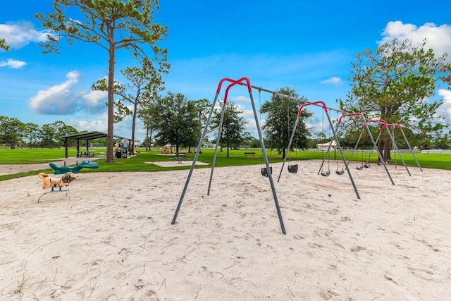 view of playground featuring a lawn