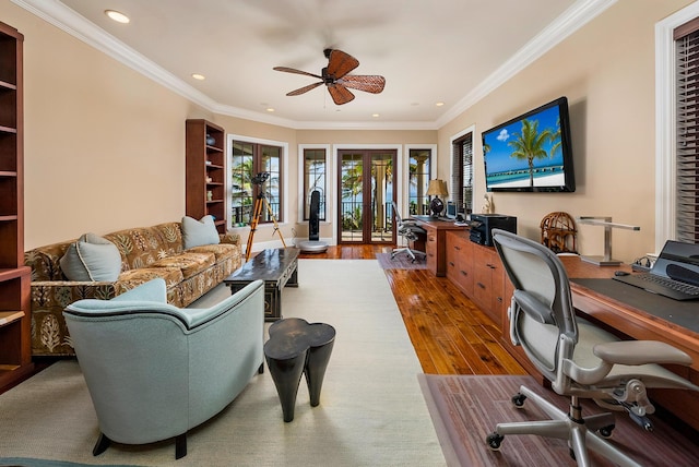 home office with dark hardwood / wood-style flooring, ornamental molding, french doors, and ceiling fan