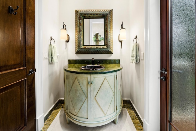 bathroom featuring tile patterned floors and vanity