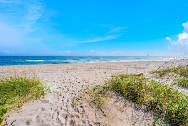 property view of water featuring a beach view