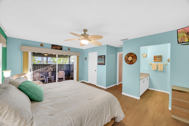 bedroom featuring light wood-type flooring and ceiling fan