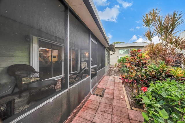 view of home's exterior featuring a sunroom