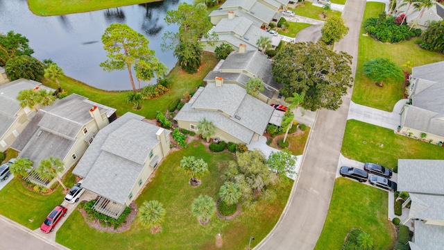 drone / aerial view with a water view