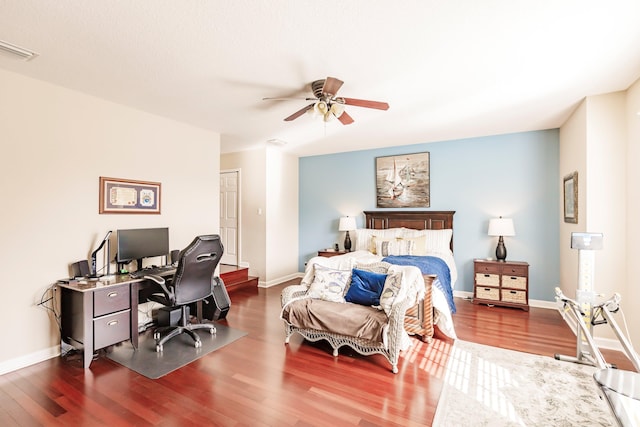 bedroom featuring ceiling fan, wood-type flooring, and a closet